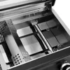 Close-up view of the interior of a gas grill, showing the burners and heat shields. Produktbild-Vorschau