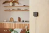 A smart home hub is mounted on a wall in a modern dining room. Anteprima dell’immagine prodotto