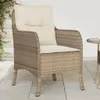 An outdoor chair with cushions on a patio. Produktbild-Vorschau