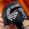 A close-up shot of a LEGO Kylo Ren helmet. Voir les images du produit