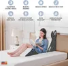 A woman is reading a book while sitting on a bed with a wedge pillow. Anteprima dell’immagine prodotto