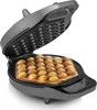 A bubble waffle maker with waffles inside. Produktbild-Vorschau