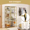 A gold and white bookshelf filled with decorative items and bags, placed in a room setting next to a bed and a door. Náhľad obrázku produktu