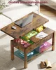 A vintage-style coffee table with its top lifted to reveal storage compartments. A laptop and mouse are on the table surface. Voir les images du produit