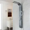 A modern bathroom with a white vanity and a sleek, dark gray shower panel mounted on a marble-tiled wall. Podgląd zdjęcia produktu