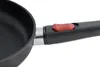 Close-up of a frying pan handle with a red button. Produktbild-Vorschau