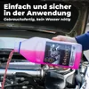 A hand is pouring pink coolant from a bottle into a car engine. Produktbild-Vorschau