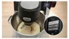 A kitchen mixer with dough in the bowl, and a close-up of its digital display showing program options. Náhled obrázku produktu