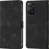 A black leather flip wallet case for a smartphone is shown from the front and back. Produktbild-Vorschau