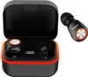 A pair of black TWS Bluetooth earbuds in an open charging case, with one earbud shown separately. Podgląd zdjęcia produktu