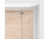 Close-up of a bamboo roller blind mechanism and the top part of the blind. Náhled obrázku produktu
