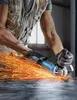 A person using an angle grinder, creating a shower of sparks. Produktbild-Vorschau