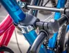 A close-up view of a bicycle rack holding two bicycles. Podgląd zdjęcia produktu