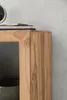 A close-up view of the corner of a wooden shelf unit against a concrete wall. Produktbild-Vorschau