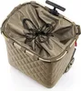 A close-up, top-down view of a brown quilted shopping trolley bag with a drawstring closure and a retractable handle. Voir les images du produit