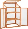 A wooden greenhouse with clear panels and shelves, shown with its doors and lid open. Náhled obrázku produktu