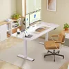 A modern home office setup with a standing desk, dual monitors, and a comfortable chair. Produktbild-Vorschau