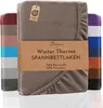 Folded fleece bed sheets in various colors, with a central product label. Produktbild-Vorschau