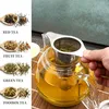 A collage showing different types of tea and a glass teapot with a tea infuser. Produktbild-Vorschau