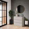 A dresser with decorative items and plants in a room. Produktbild-Vorschau