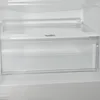 The interior of a refrigerator with a clear crisper drawer. Produktbild-Vorschau