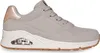 A side view of a gray Skechers sneaker with a white sole and a brown outsole. Produktbild-Vorschau