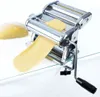 A chrome pasta maker is shown with a sheet of dough being fed through it. Náhľad obrázku produktu