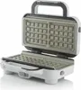 An open waffle maker on a white background. Produktbild-Vorschau