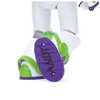A close-up view of the sole of a Buzz Lightyear action figure's boot, showing the name 'ANDY' written in purple marker. Voir les images du produit