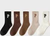 Five pairs of socks are displayed side-by-side against a light gray background. Podgląd zdjęcia produktu