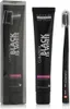 A black toothpaste tube and a black toothbrush are displayed next to each other on a white background. The toothpaste tube is in its packaging on the left, and the toothpaste tube and toothbrush are shown separately on the right. Anteprima dell’immagine prodotto