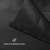 Close-up of black fabric with a brush icon and text. Náhled obrázku produktu