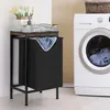 A laundry basket with a shelf next to a washing machine. Podgląd zdjęcia produktu