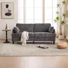 A living room scene with a sofa, side table, and plant. Produktbild-Vorschau
