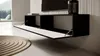 A modern living room with a wall-mounted TV stand. Produktbild-Vorschau