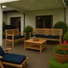 An outdoor patio scene with wooden furniture and cushions. Produktbild-Vorschau