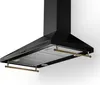 A black kitchen range hood with gold accents, shown against a white background. Produktbild-Vorschau