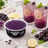 Bubble-Tea-Glaeser mit Popping Boba Traube und Zitronenscheiben dekoriert Podgląd zdjęcia produktu