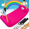 A pink swing seat with ropes and carabiners, set against a backdrop of a rainbow and clouds. Produktbild-Vorschau