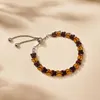 Bernstein Armband Schmetterlinge kirschrot und cognacfarben Produktbild-Vorschau 1