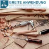 A close-up view of woodworking tools, including a hand drill, on a wooden surface with wood shavings. Produktbild-Vorschau