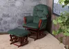 A green glider chair and ottoman set with a dark red wooden frame, placed on a cream rug in front of a stone wall and a wood-paneled wall. Podgląd zdjęcia produktu