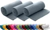 Three rolled up gray fleece blankets are shown at the top, with a row of different colored rolled up blankets below. Produktbild-Vorschau