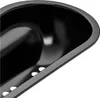 A close-up of the inside of a black baking mold. Produktbild-Vorschau