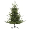 A green artificial Christmas tree on a black stand, isolated on a white background. Podgląd zdjęcia produktu