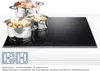 An induction cooktop with pots and pans on it, and feature icons below. Podgląd zdjęcia produktu