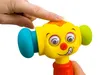 A close-up shot of a person's finger pressing on a colorful, cartoonish toy hammer. Voir les images du produit