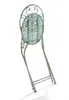 A vintage-style metal garden chair is shown from the back, folded and leaning. Produktbild-Vorschau