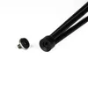 A close-up shot of a screw and a set of black hairpin legs on a white background. Podgląd zdjęcia produktu