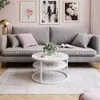 A living room scene with a gray sofa, a white coffee table, and artwork on a pink wall. Produktbild-Vorschau